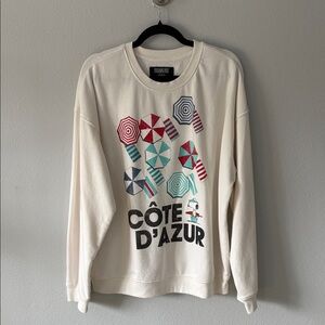 Peanuts Cream Crewneck Sweater with Red, Teal, Navy and Black Umbrella Graphic